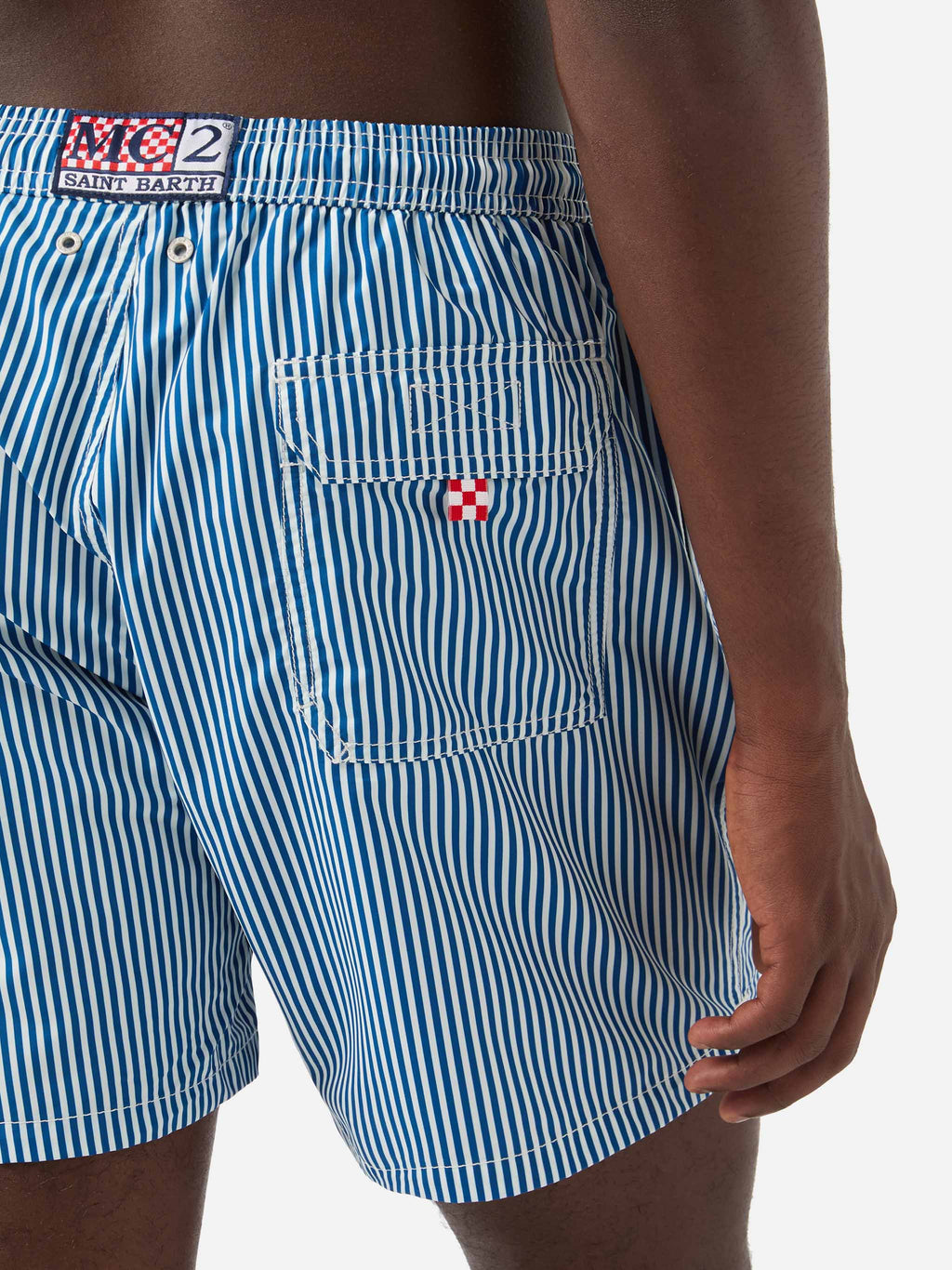Syros swim shorts with white and blue striped pattern