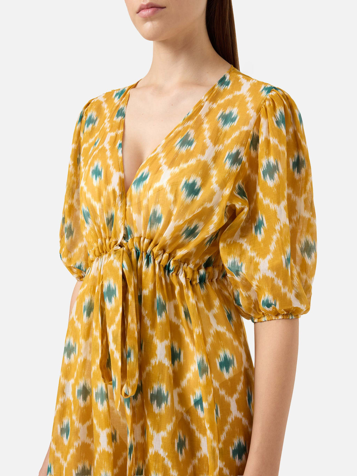 Crunchy one-piece swimsuit in pistachio green glossy finish with charms