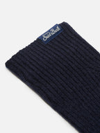 Long socks with argyle pattern