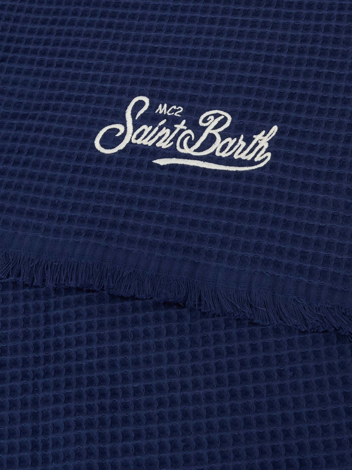 Blue beach towel with integrated bag
